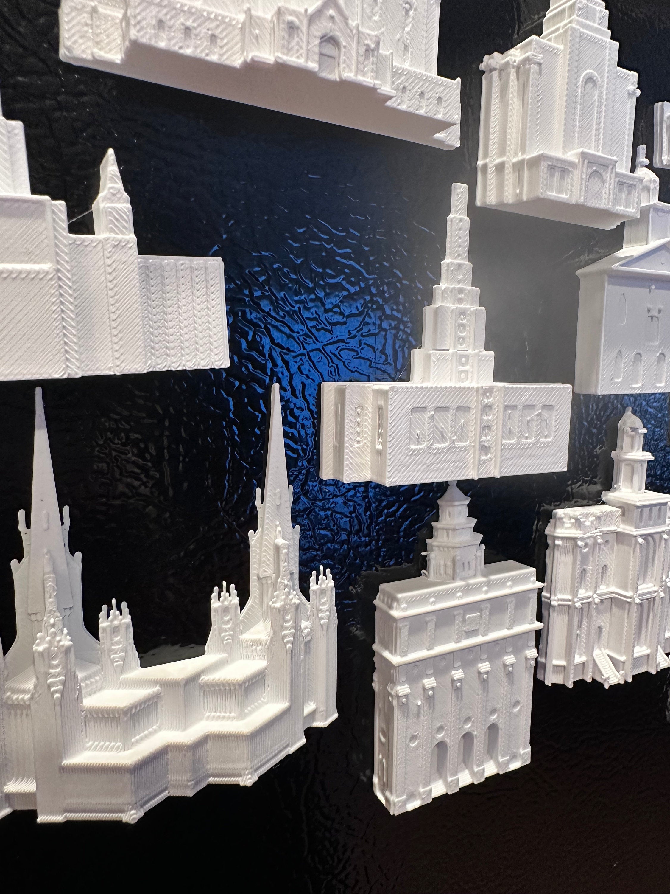 multiple temple magnets on a tin board